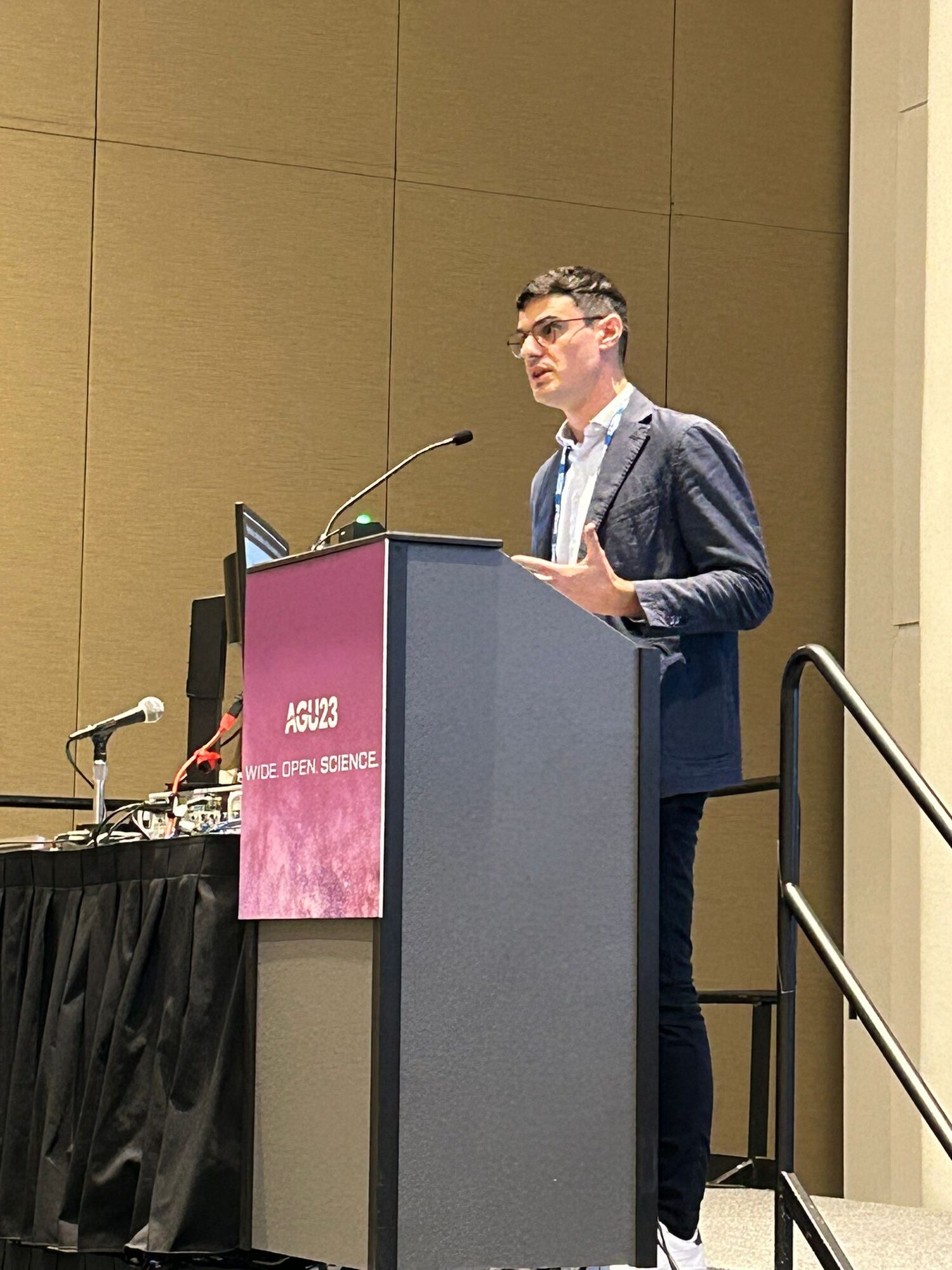 Luca Dal Zilio speaking at a conference