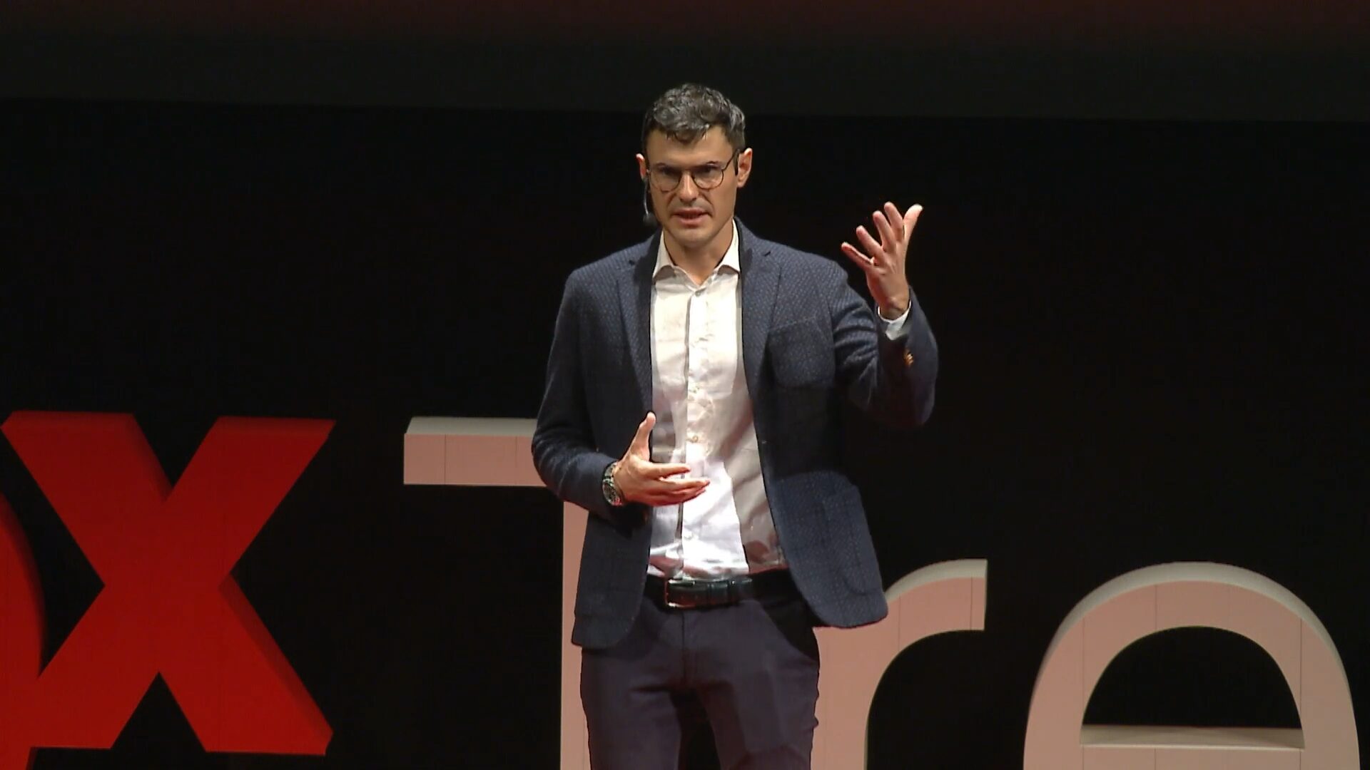 Luca Dal Zilio speaking at a TEDx event