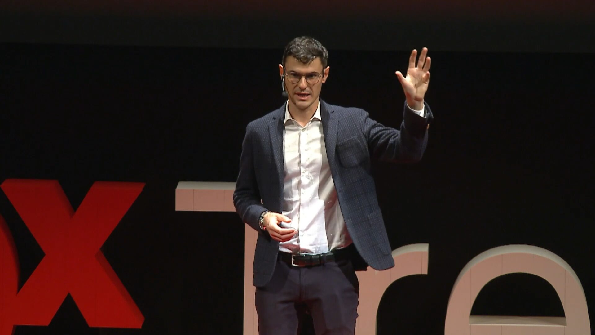 Luca Dal Zilio speaking at a TEDx event